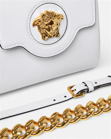 versace tasche medusa weiss henkeltasche|Versace la medusa book.